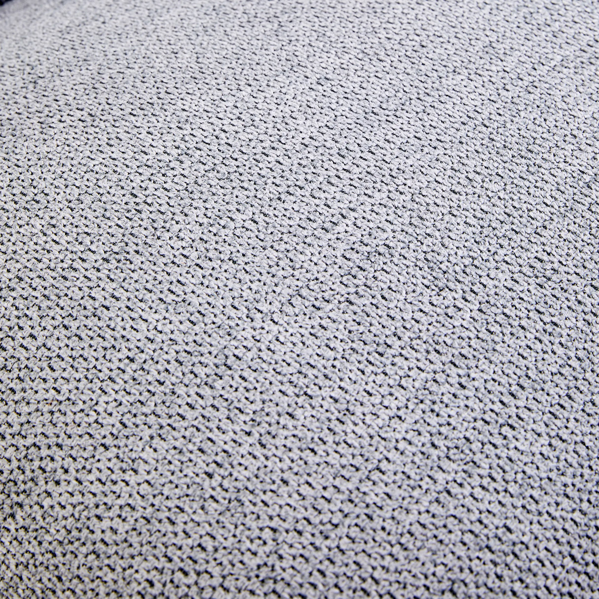 Dunkelgrauer Stoffbezug des Loungesessels Criss-Cross 20 mit grober Webstruktur von hjh LIVING