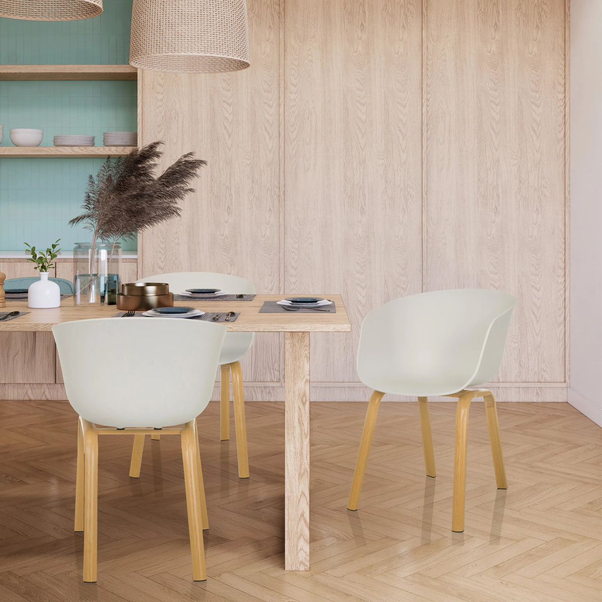 Weiße Schalenstühle OSLO W mit hellen Holzbeinen an einem Esstisch von hjh LIVING