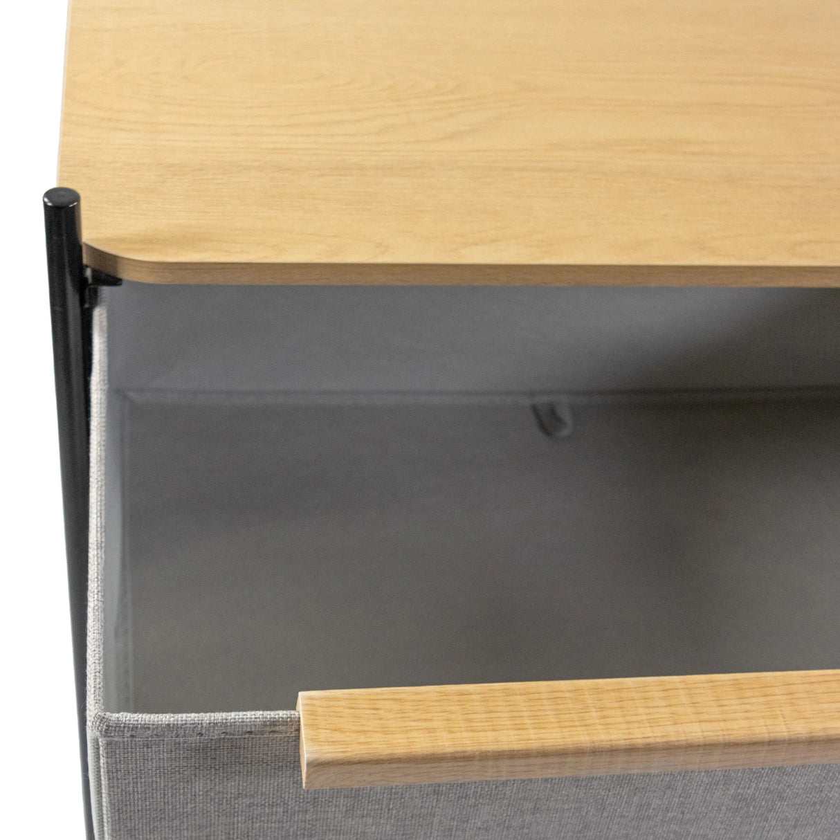 Ausgezogener grauer Stoffkorb mit Holzgriff der Kommode STUVAR von hjh LIVING