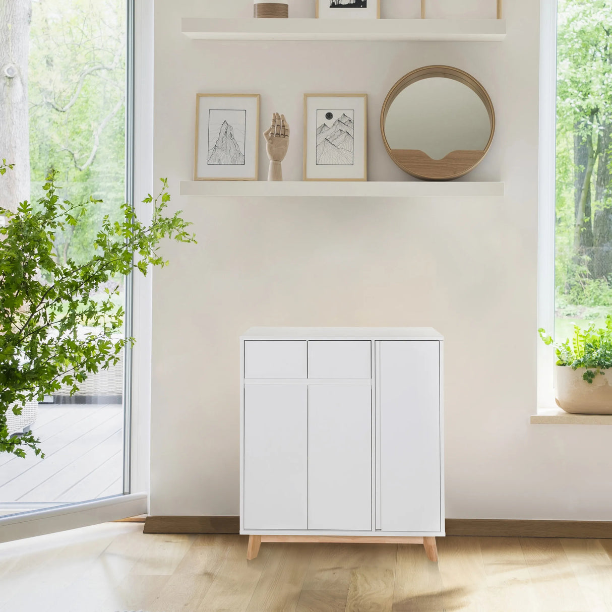 Weiße Kommode ESTHA mit zwei Schubladen und zwei Türen auf hellen Holzfüßen von hjh LIVING