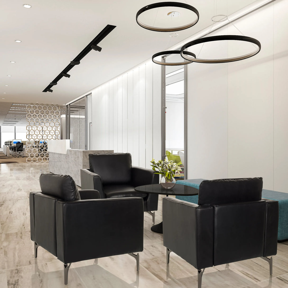 Drei schwarze Loungesessel BAVERO aus Kunstleder in einer modernen Büro-Lounge von hjh OFFICE