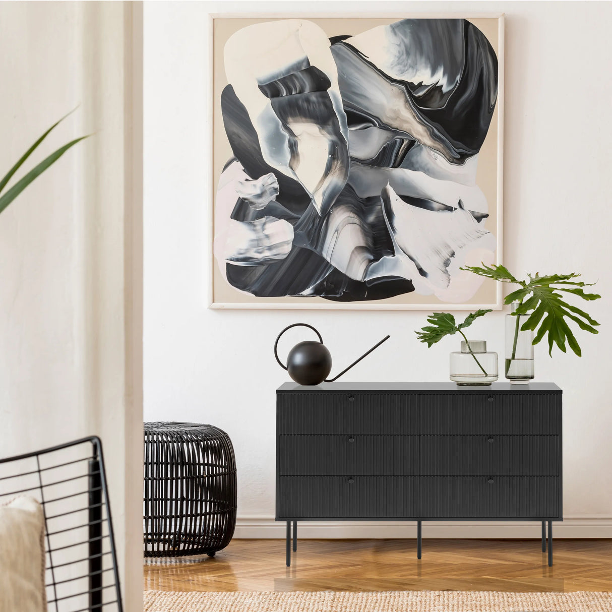 Schwarzes Sideboard KARBY S mit drei Schubladen und schlanken Beinen von hjh LIVING