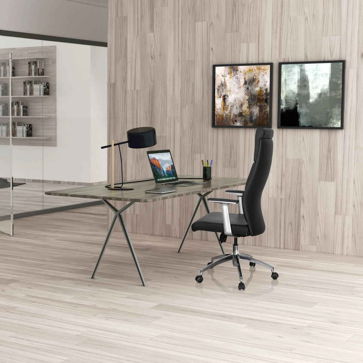 Luxus-Chefsessel MONZA 20 in Schwarz an einem Schreibtisch in einem hellen Raum von hjh OFFICE