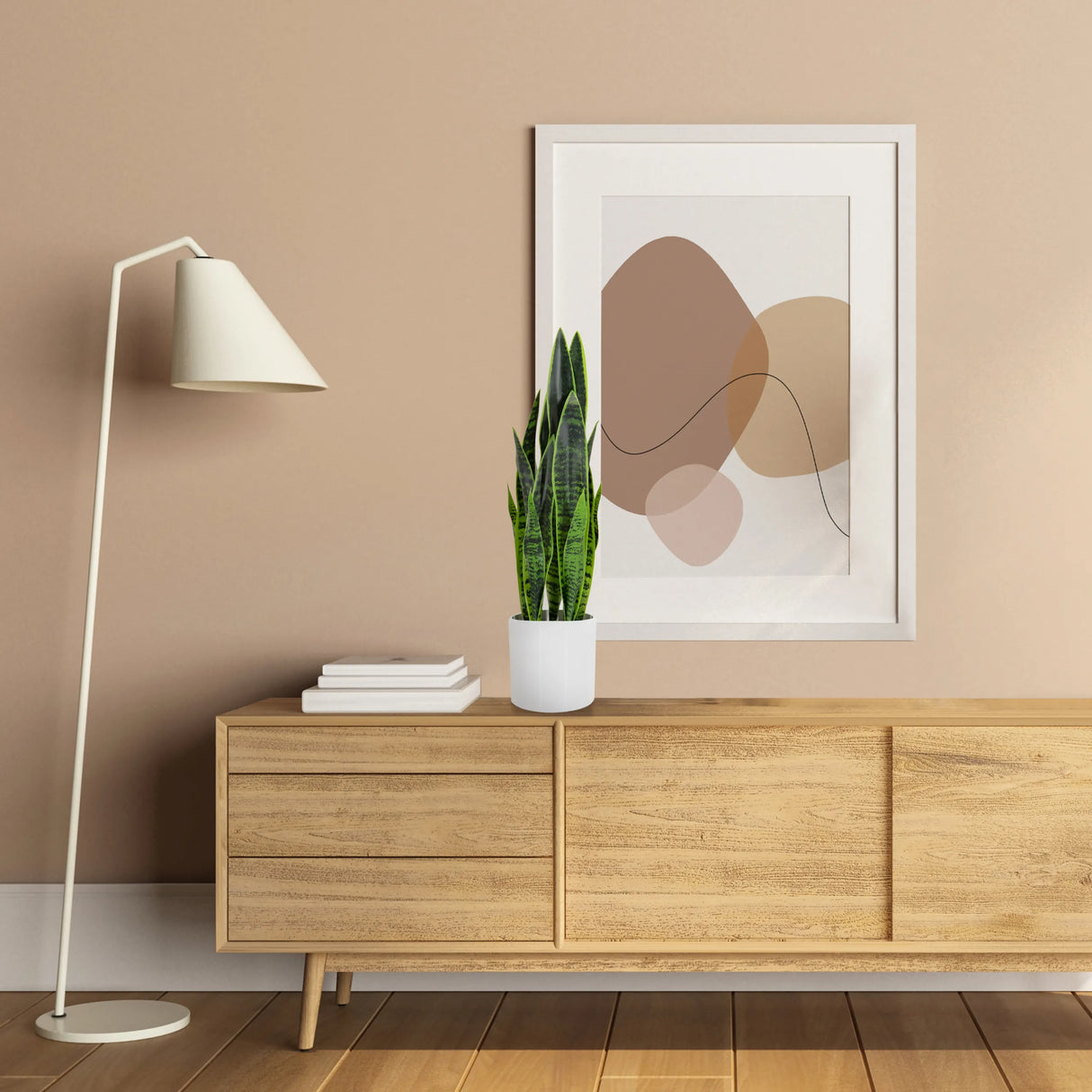 Grüne Kunstpflanze SANSEVIERIA in einem weißen Topf auf einem Sideboard aus Holz von hjh OFFICE