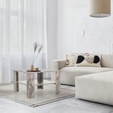 Grauer Couchtisch BISMO mit Marmoroptik, zwei Ebenen und einer quadratischen Form im Wohnbereich von hjh LIVING