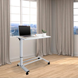 Weißer Stehschreibtisch STAND II mit Rollen und Laptop auf einer hellen Holzbodengruppe von hjh OFFICE