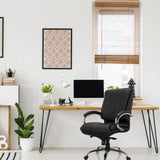 Schwarzer Drehstuhl XXL H 100 aus Kunstleder an einem Schreibtisch von hjh OFFICE