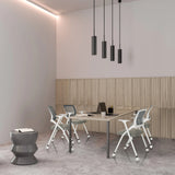 Graue Klappstühle PRIORITY II W PU an einem Besprechungstisch in einem modern gestalteten Raum von hjh OFFICE