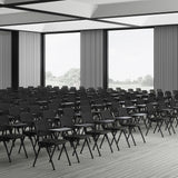 Schreibtabletts MEET WA in Schwarz an einer Reihe von Konferenzstühlen von hjh OFFICE