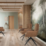 Braune Polsterstühle TARUGO mit schwarzen Sternfüßen in einem modernen Raum von hjh LIVING