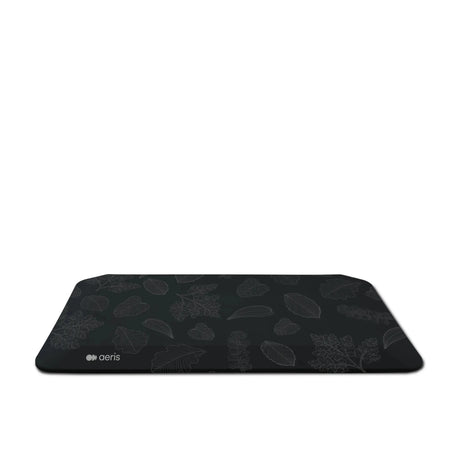 Schwarze Fußablage MUVMAT BK mit Blattmuster-Motiv Leaf Art von Aeris - Impulsmöbel